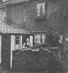 Mr. and Mrs. Pearce at their home.